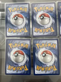 Pokemon Prismatic Cosmo Promo Cards (8) Mini Tin Evolutions Costco Pack - Image 4