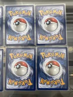 Pokemon Prismatic Cosmo Promo Cards (8) Mini Tin Evolutions Costco Pack - Image 5