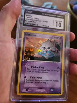 (TOP POP 5) CGC 10 GEM MINT Meditite 65/101 HOLO EX Hidden Legends Pokemon Card - Image 1