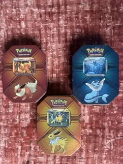 Pokemon TCG Triple Effect Tin Vaporeon Flareon Jolteon Set Of 3 Some Wear SEALED - Image 1