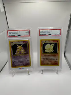 1999 Pokemon Base Set Alakazam & Ninetales Holo PSA Lot - Image 1