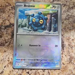 The Pokemon Company Bronzor 066/131 Sv Prismatic Evolutions Holo masterball - Image 1