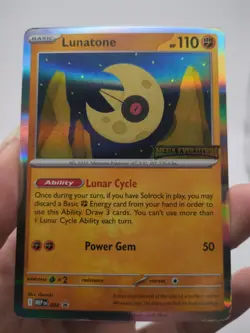 Pokemon Lunatone 004 Me01: Mega Evolution Rare Holo stamped promo - Image 1
