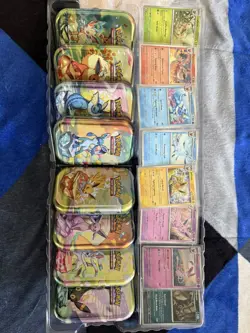 Pokemon Prismatic Evolutions Mini Tins + Costco Promo Cards Set of 8 - Cosmos - Image 1
