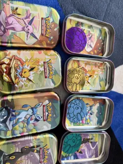 Pokemon Prismatic Evolutions Mini Tins + Costco Promo Cards Set of 8 - Cosmos - Image 3