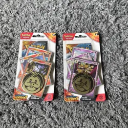 Pokemon S&V Surging Sparks: Premium Checklane Blister Chandelure + Alakazam X 2 - Image 1