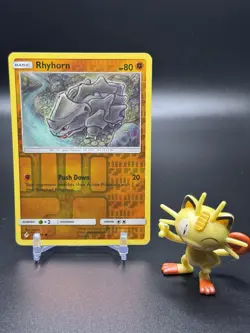 Rhyhorn 92/214 Pokemon Sun & Moon - Unbroken Bonds Reverse Holo - NM - Image 1