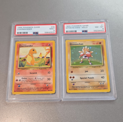 Wizards 1999 Pokemon Game 2-Card Lot Charmander #46 Hitmonchan Holo #7 PSA - Image 1