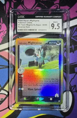 CGC 9.5 Team Aqua's Mightyena Team Magma Vs Aqua 30/95 Reverse Holo Pokemon Card - Image 1