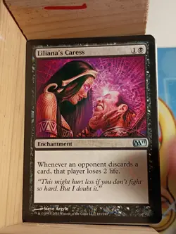 Liliana's Caress Core Set 2011 (M11) Regular - Image 1