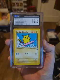 Pokemon TCG Surfing Pikachu Black Star Promo 28 CGC 8.5 Pokemon League 2001 - Image 1