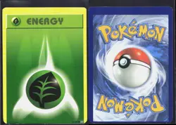 GRASS ENERGY 91/108 C EVOLUTIONS POKEMON NM/M (OFFCUT/MISCUT ERROR) - Image 1