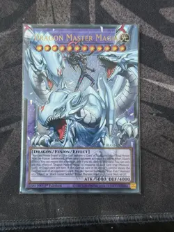 Dragon Master Magia - BLGG-EN137 - Ultra Rare - Yugioh! - Image 1