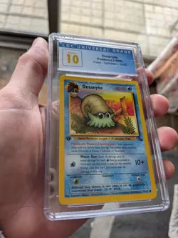 (POP 59) CGC 10 PRISTINE Omanyte 1999 Fossil 1st Edition 52/62 Pokemon Card - Image 1