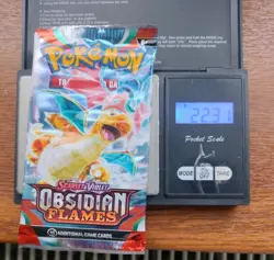 Heavy 22.31g Pokemon Tcg obsidian flames Booster Pack Factory Sealed New - Image 1