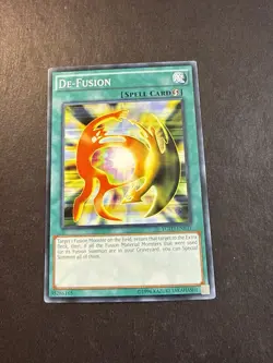 De-Fusion - YGLD-ENB31 - Common Unlimited Edition yugioh - Image 1