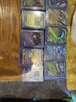 20 Stacks Of Pokemon Cards In Top Loaders - Image 1