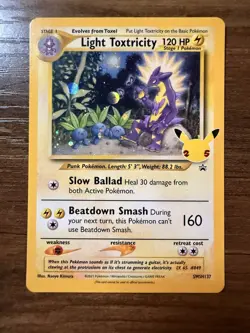 Pokemon TCG Light Toxtricity SWSH137 English Holo Card Celebrations Rare NM - Image 1