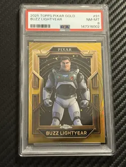 2025 Topps Disney Pixar Gold Buzz Lightyear PSA 8 - Image 1