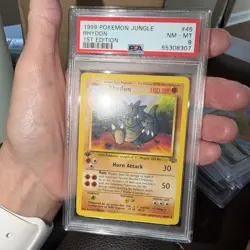 1999 Pokemon Jungle Rhydon 1st Edition Uncommon 45/64 PSA 8 - Image 1