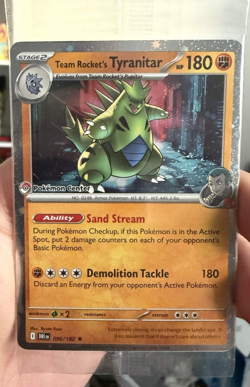 TEAM ROCKET’S TYRANITAR POKEMON CENTER EXCLUSIVE STAMPED 096/182 SEALED - Image 1