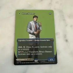 1x Bruce Banner (Borderless) (0359) - Near Mint MTG Marvel Super Heroes in hand - Image 1