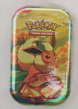 Pokemon Scarlet & Violet Prismatic Evolutions Mini Tin Flareon Factory Sealed - Image 1