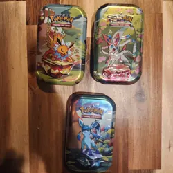 Pokemon TCG Scarlet & Violet Prismatic Evolutions Mini Tins (Lot of 3) - Sealed - Image 1
