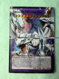 Yugioh BLGG-EN137 Dragon Master Magia - Extended Art Ultra Rare 1st Edition - Image 1