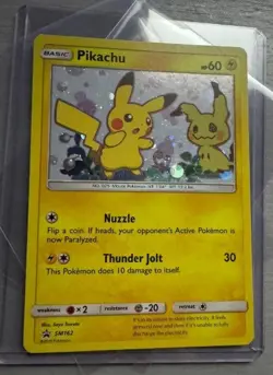 Pokemon TCG SM162 Pikachu and Mimikyu Sun and Moon Black star promo - Image 1
