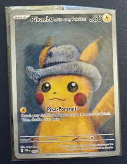 Pokemon Pikachu Van Gogh SVP EN-SV 085 Sealed Promo Card with Grey Felt Hat - Image 1