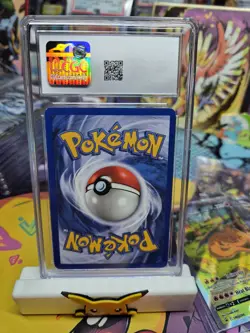 The Pokemon Company Meowth Team Rocket 1st Edition 62/82 CGC 8.5 Pokemon Card - Image 2