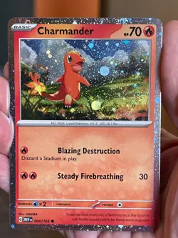 POKEMON CHARMANDER 004/165 COSMOS HOLOFOIL SWIRLS SCARLET & VIOLET 151 NM CARD - Image 1