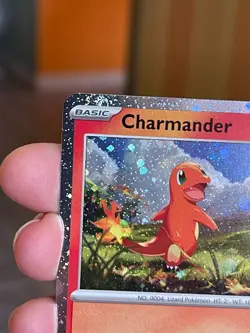 POKEMON CHARMANDER 004/165 COSMOS HOLOFOIL SWIRLS SCARLET & VIOLET 151 NM CARD - Image 3