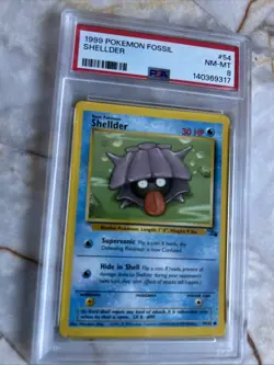 Pokemon TCG Shellder Fossil No.54 PSA 8 - Image 1