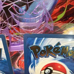 Pokemon TCG Base Set Holo 2-Card Lot - Charizard 4/102, Pikachu metal cards - Image 5