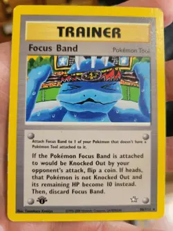 Pokemon Focus Band 86/111 Neo Genesis-1st Edition Regular mod play - Image 1