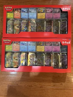 Pokemon Prismatic Evolutions 8 Mini-Tins with Promo Cards Costco 2-pack - Image 1