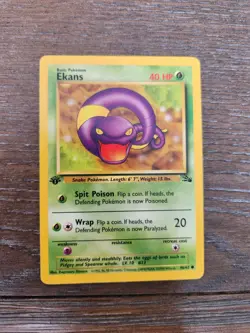 1st Edition Ekans 46/62 Fossil Non Holo Common WoTC Pokemon 1999 LP - Image 1