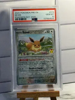 2025 POKEMON PRE EN-PRISMATIC EVOLUTIONS POKEMON DAY 2025 #074 EEVEE PSA 10 - Image 1