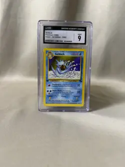 1999 Pokemon 1st Edition Fossil Golduck CGC 9 Mint 35/62 - Image 1