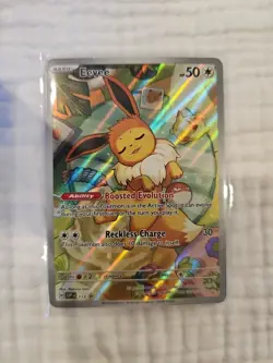 Pokemon Prismatic Evolutions Eevee #173 ETB Promo, Unsealed, Near Mint Condition - Image 1