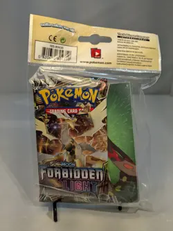 Pokemon Sun & Moon Forbidden Light Booster Pack and Mini Portfolio - Image 2