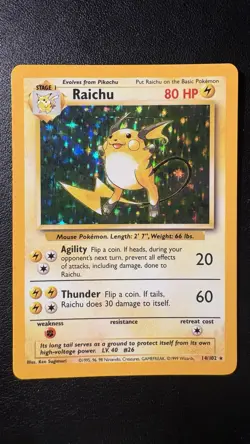 Pokemon TCG Base Set Raichu Holo Card 14/102 NM Condition - Image 1
