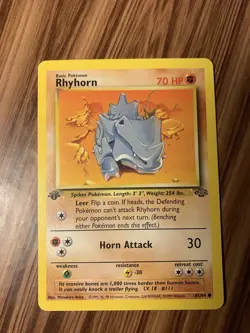 💥 Rhyhorn 1st Edition 61/64 Jungle Set Non Holo Foil Pokemon 1999 Vintage Card - Image 1