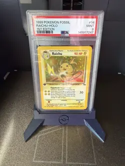 1999 Pokemon Raichu 14/62 Fossil Holo 1st Edition PSA 9 - Image 1