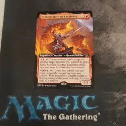 Orthion, Hero of Lavabrink 0334, NM, March of the Machine, Extended Art MTG Card - Image 1