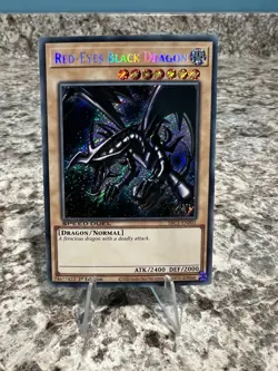 YuGiOh Red-Eyes Black Dragon SBC1-ENF01 1st Edition Secret Rare - Image 1