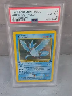 1999 POKEMON FOSSIL ARTICUNO HOLO 1ST EDITION PSA 8 - Image 1