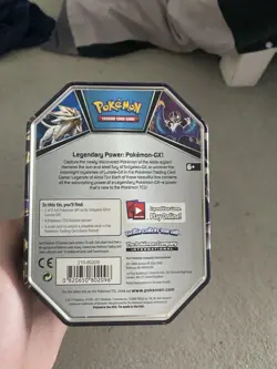 Pokemon TCG Tin Filled With random Pokemon cards including holos - Image 2